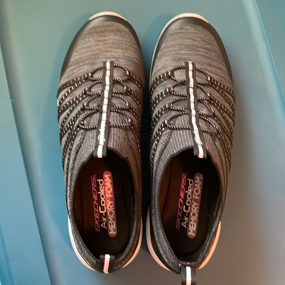 Sketchers slip on - air cooled memory foam 😊. Size 10 charcoal/black and white